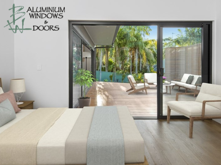 Woman Standing by Bedroom Window and Opening Curtains. 