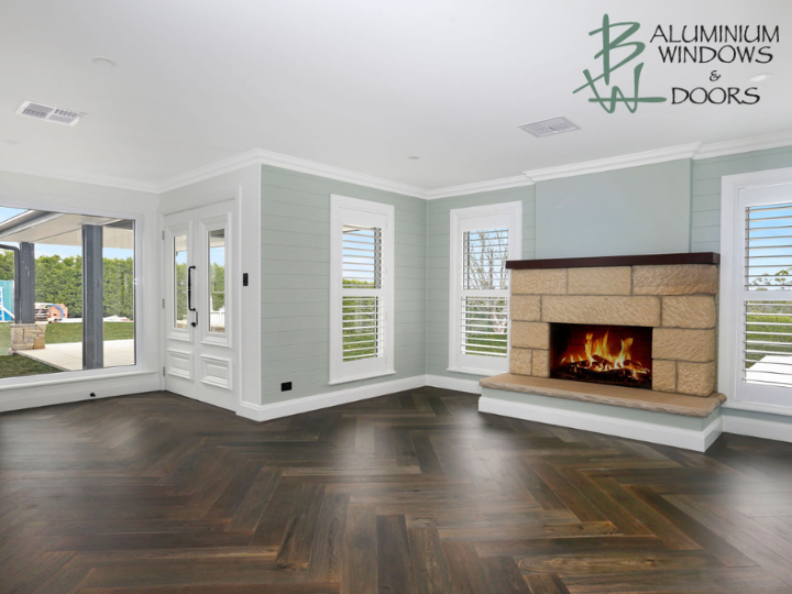 Woman Standing by Bedroom Window and Opening Curtains. 