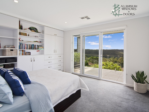 Woman Standing by Bedroom Window and Opening Curtains. 